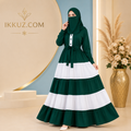 Elevate your modest wardrobe with this Premium Green &amp; White Tiered Ruffle Abaya with Matching Niqab Set, designed for women who love elegant Islamic fashion with a modern and graceful touch.